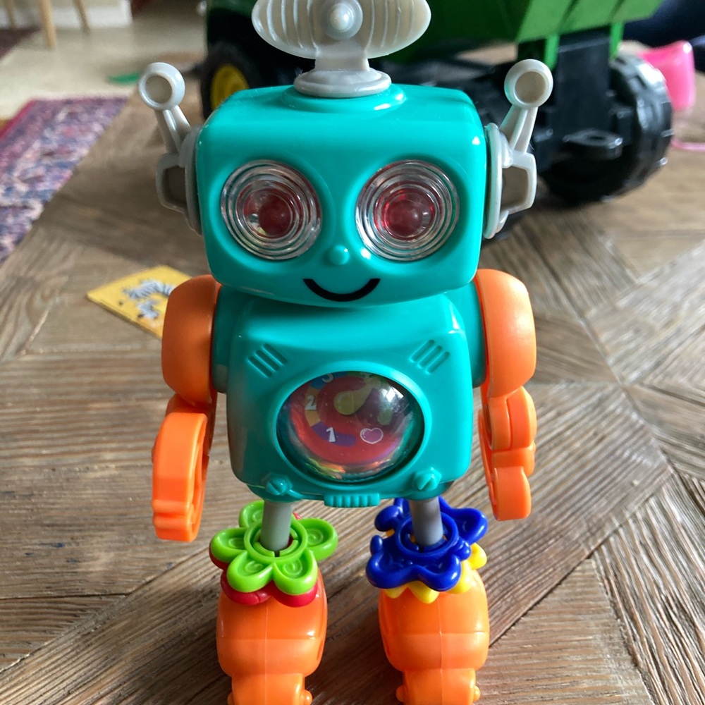 Ratcheting robot baby toy